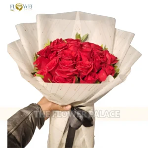 Premium large bouquet of 25 fresh red roses in elegant white wrapping for delivery in Islamabad