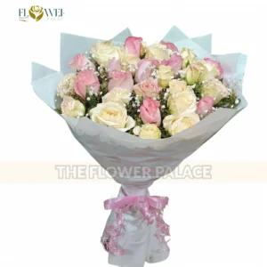 Beautiful red and white rose bouquet with baby's breath fillers in premium wrapping.