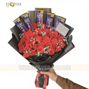 Red roses and Dairy Milk chocolate bar bouquet delivery in Islamabad
